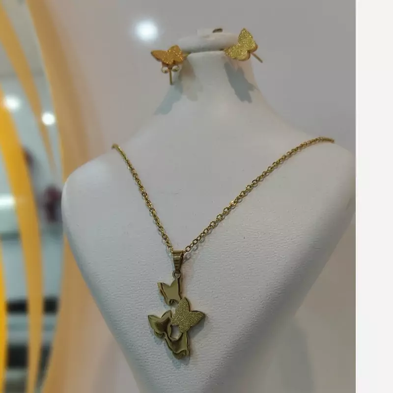 نیم ست پروانه طلایی استیل رنگ ثابت